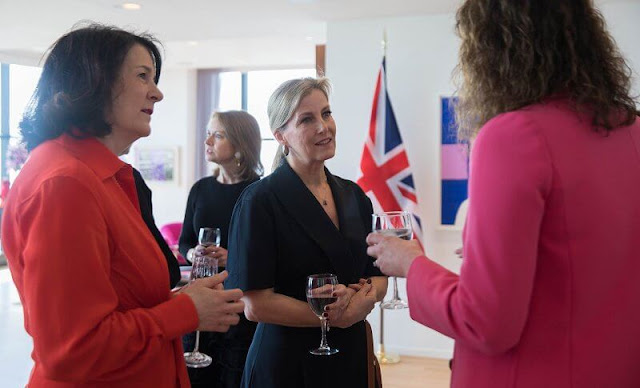 The Countess of Wessex wore a wrap front midi dress from LOEWE. British Deputy Consul General to New York Hannah Young