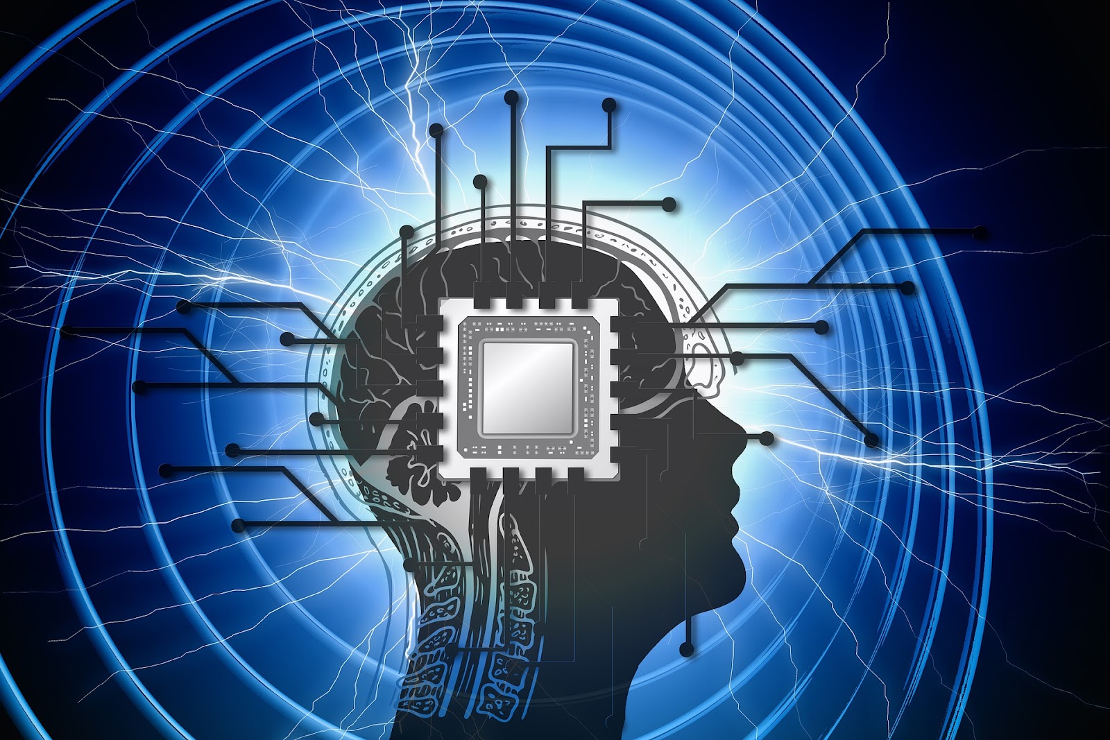 A silhouette of a human head with a stylised CPU where the brain would be.