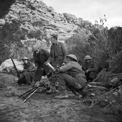 A 3 inch mortar crew from the 6th Battalion Queens Own Royal West Kents of 78th Infantry Division in action in Tunisia on the 31st of January 1943