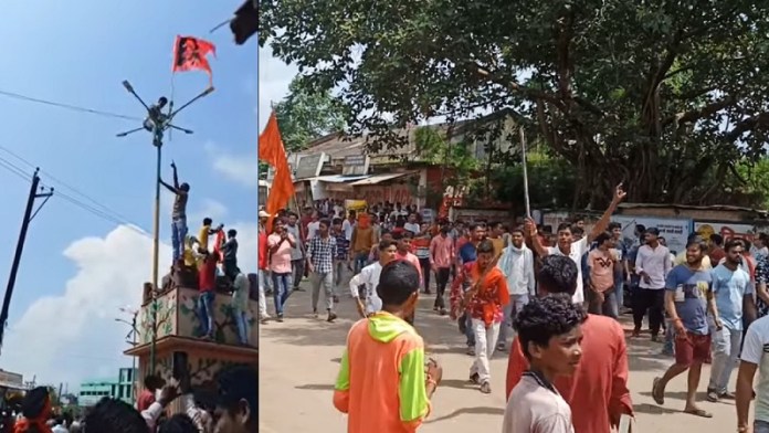 Hindu groups reinstall saffron flag at the same spot where Muslim mob had ripped it off, protest against Congress govt
