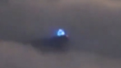A close up look at the 30,000 feet high UFO blue light.