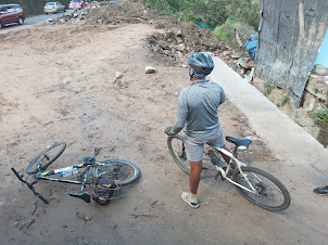 Cyclists doing the strenuous Kundala Dam to Munnar mountain cycling.