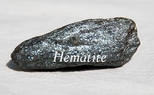 Hematite: Black with a shiny surface.