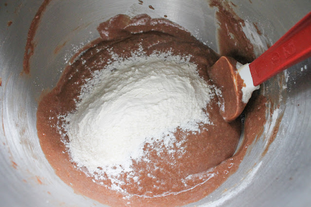 Folding in the flour in three batches