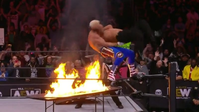 Cody Rhodes Put Andrade Through A Flaming Table