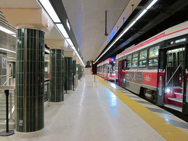 Spadina's streetcar platform turned Spadina into a true, if somewhat inadvertent, intermodal hub. While you're here, check out the rare lower-case station identification signage.