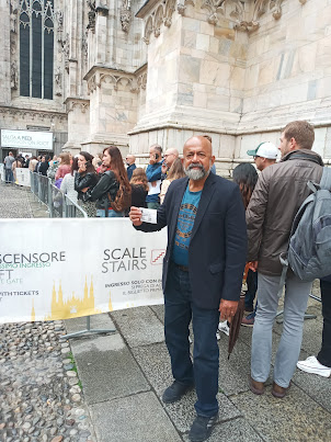 In queue to walk the 251 steps to the top of Milan Cathedral ( Milano Duomo)