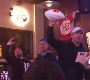 Bengals coach Zac Taylor delivers game ball to Mt. Lookout Tavern in Cincinnati, 1/15/2022