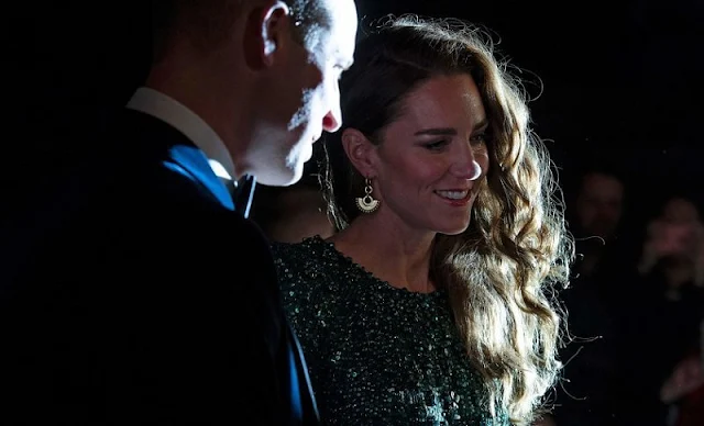 Kate Middleton wore a green gown by Jenny Packham. ​Emmy London pumps and Missoma London earrings