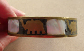 Asian brass elephant bangle with MOP shell