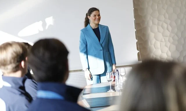 Crown Princess Victoria wore a blue wool blend suit, jacket and trousers from H&M. Blue earrings by Dulong