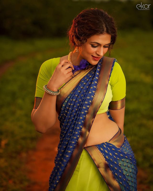 Shraddha Das is A Captivating Kaleidoscope in Bright Green and Blue Half Saree