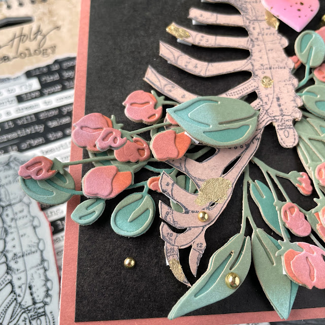 Valentine's Day card made with: Tim Holtz anatomy chart stamp, bloom colorize die, kraft stock, distress oxide in kitsch flamingo and cracked pistachio, small talk stickers; Pinkfresh puffy heart stickers, gold pearls