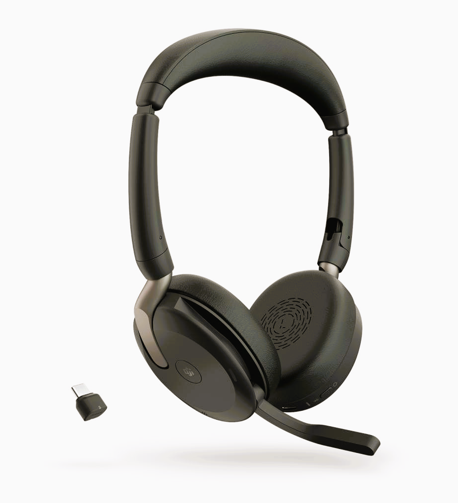 “A pair of dark-colored wireless headphones with a detachable microphone, and a USB dongle on a white background.”