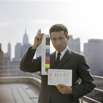 color photograph of Tony Vaccaro holding a test stip, NY, 1968