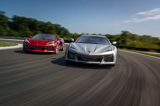 Two models of the all-new 2023 Chevrolet Corvette Z06 -  convertible in red color and a coupe in silver.