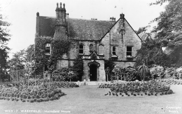 Holmfield House situated in Thornes Park, a pretty but relatively small building surrounded by plants and shrubs