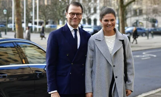 Crown Princess Victoria wore a merino cable knit sweater from & Other Stories. Alexandre de Paris large clip. Leather skirts