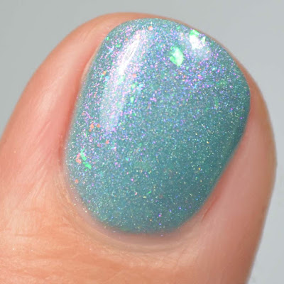 teal crelly nail polish with shimmer swatch