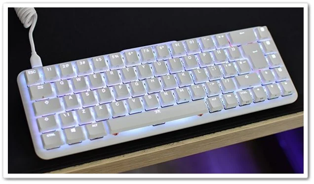 The Fnatic Streak65 LP gaming keyboard on a desk,