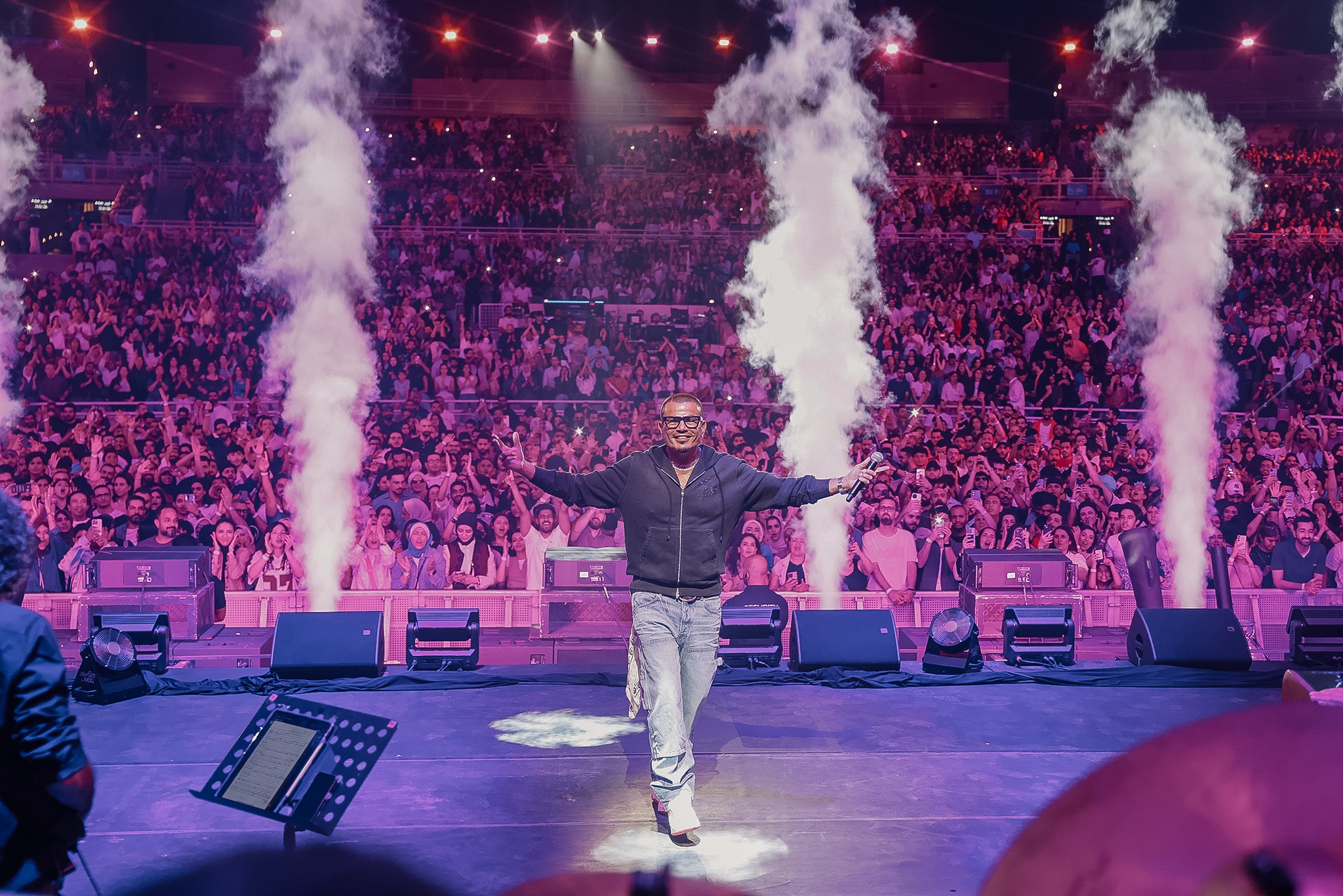 The Egyptian superstar Amr Diab lit up the stage in Bahrain on Friday night with a spectacular live performance. Thousands of fans filled the stands of BIYON Al Dana Amphitheater, creating an unforgettable atmosphere.  To celebrate the event, Diab shared a series of stunning photos on Instagram, expressing his love and appreciation for the crowd. He wrote: "See you next time in Bahrain", calling it an evening full of love and energy.