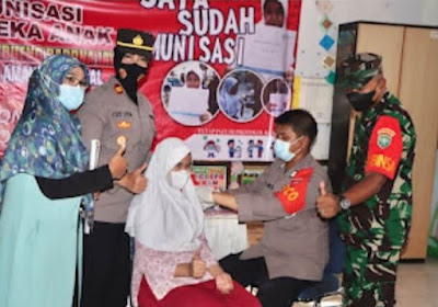 Bidhumas Polda Aceh Melaksanakan Vaksinasi Merdeka Saweu Sikula