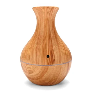 The ultra-quiet portable ultrasonic humidifier keeps your living space clean and properly moisturized Wood grain hown - store