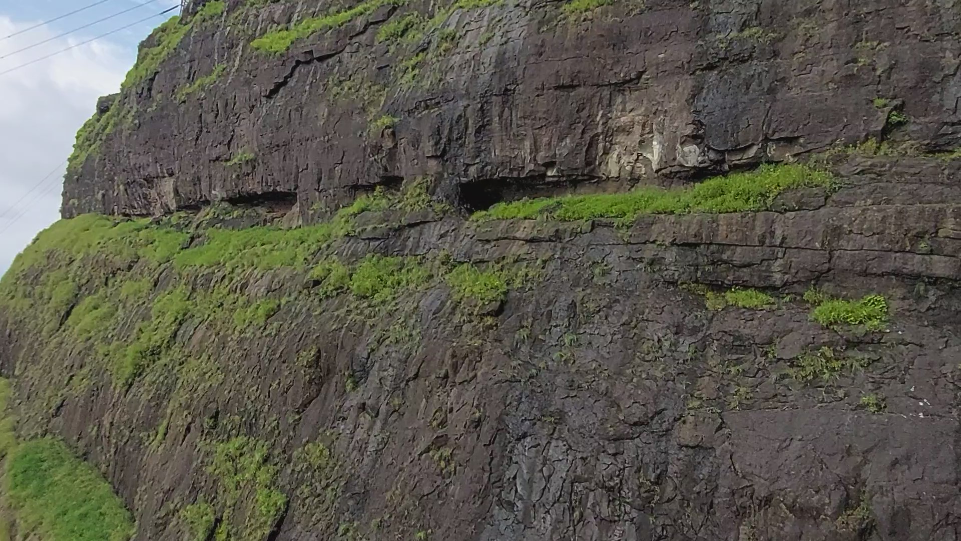 Caves carved into Mountain wall