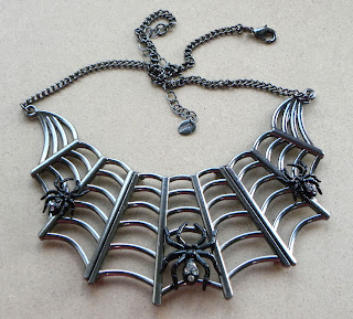 Large spider web necklace by Claire's