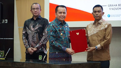 Pemerintah Provinsi, Kabupaten dan Kota Se-Sumsel Serentak Tandatangani NPHD Dana Pilkada