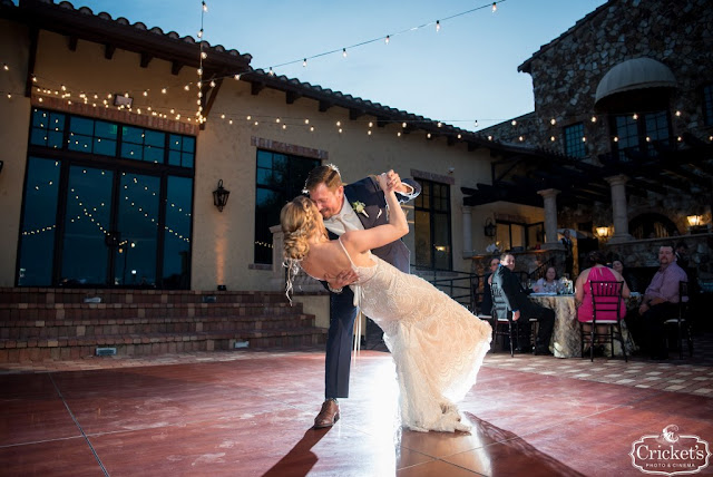 bride and groom dancing at bella collina