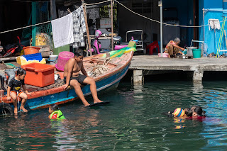 Kids swimming, Mai Rot fishing village, Trat