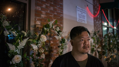 Kevin Leung stands outside of the dance studio where he rented space for years to teach Kung Fu and traditional lion dancing. He knew two of those killed in the shooting.