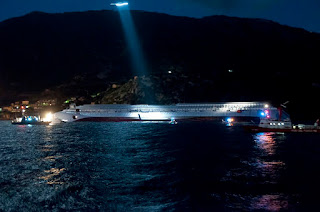 The scene off Isola del Giglio in the hours after the collision as rescuers battled to save survivors