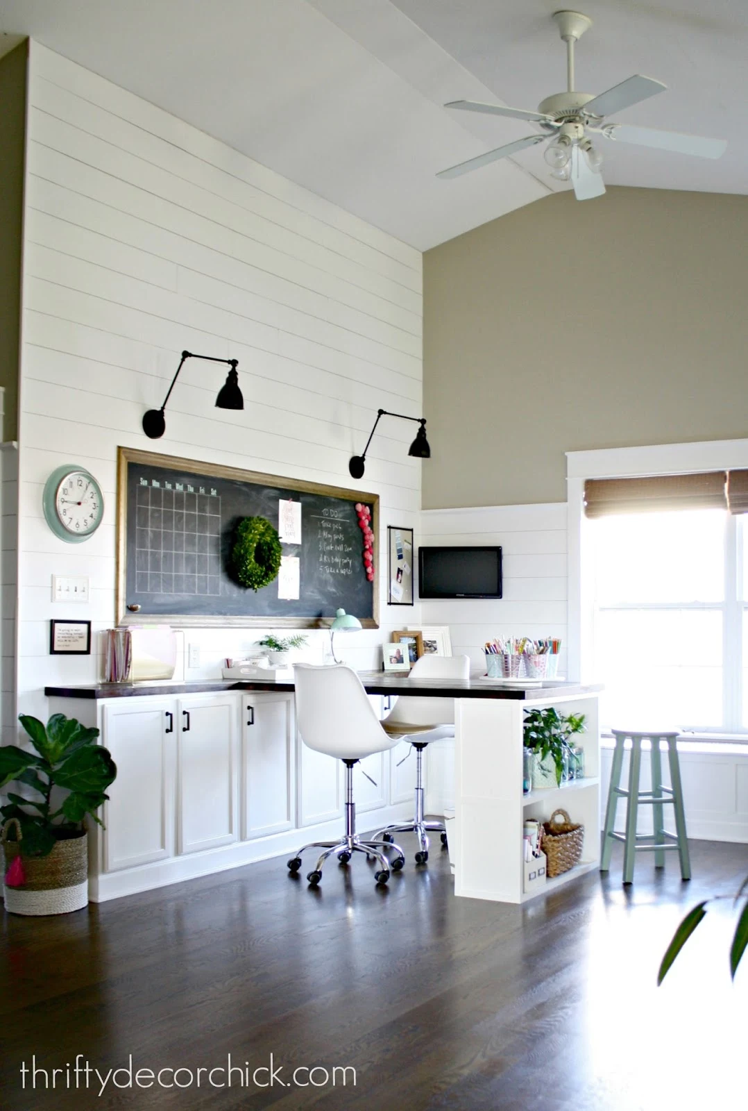 loft craft room with desk and shiplap