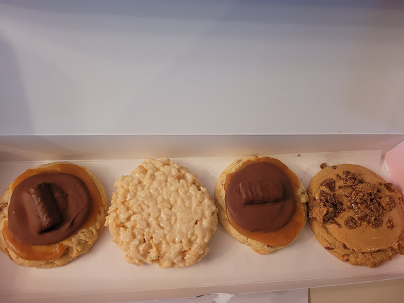 A friend had Crumbl delivered to me! Twix, Rice Krispie, more Twix, and PB Cup cookies