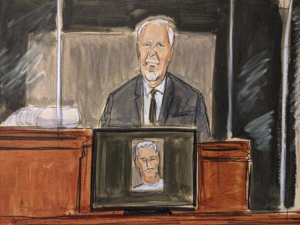 In this courtroom sketch, Lawrence Paul Visoski Jr., who was one of Jeffrey Epstein’s pilots, testifies on the witness stand during Ghislaine Maxwell’s sex trafficking trial in New York, on Nov. 29, 2021. (AP Photo/Elizabeth Williams)