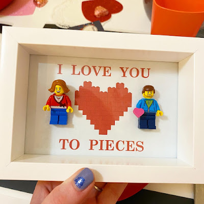 Framed Lego people with text that reads: I Love You To Pieces