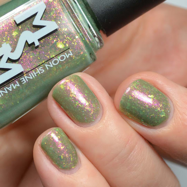 olive green nail polish with flakies swatch