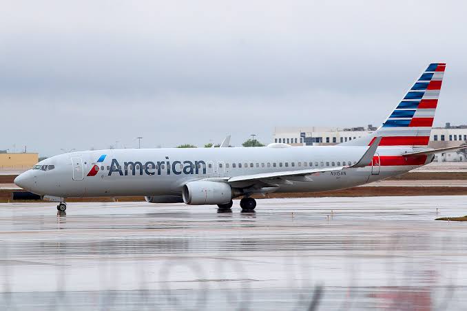 Over Mask Row, An American Airlines Airliner Spins Around In Mid-Flight.