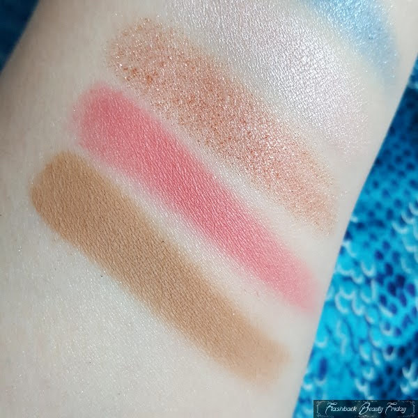 close up swatches of Omega, You're In Luck and Fortune Found MAC eyeshadows on pale arm