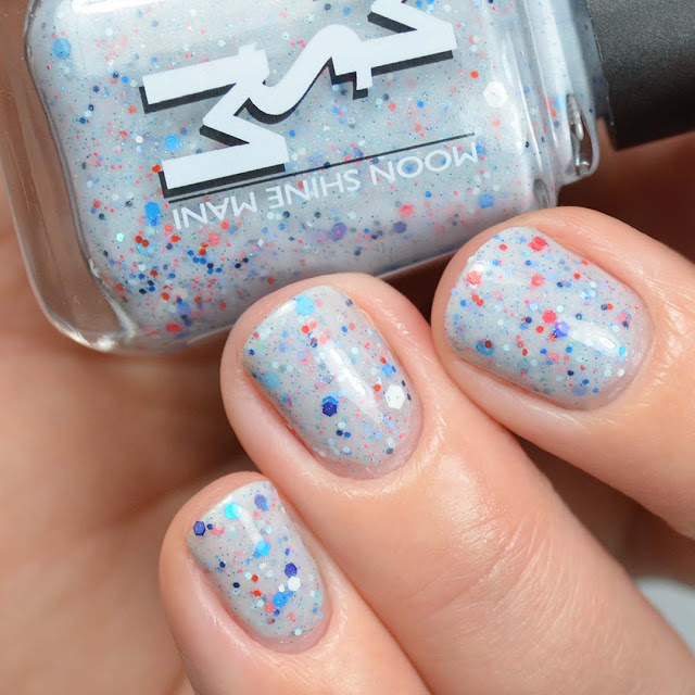 white crelly nail polish with pink and blue glitter swatch