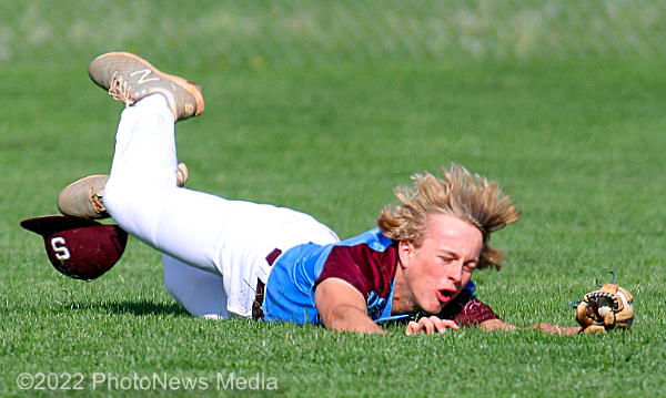 Andrew Beyers makes a diving catch for SJO