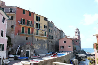 Boats fill the tiny quayside at the fishing village of Tellaro in Liguria, where Bertolucci had a home
