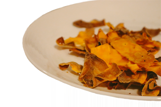 image description: white royal dalton by Gordon Ramsay plate with unevenly cooked sweet potato chips.