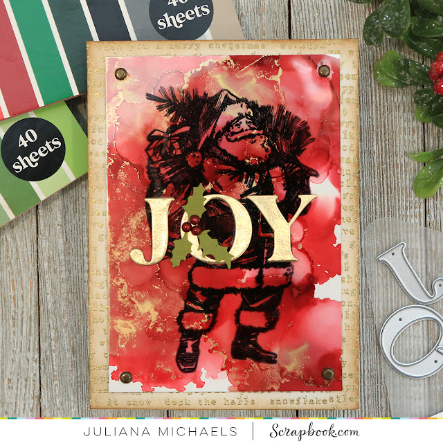 Joy Santa Christmas Card by Juliana Michaels featuring an alcohol ink background, Tim Holtz Vintage Holidays Stamp Set and Scrapbook.com Exclusive Classic Alphabet Dies