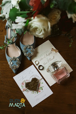 wedding invitations with rings, perfume and shoes