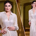 Raveena Tandon glows as she flaunts hourglass body in metallic gown