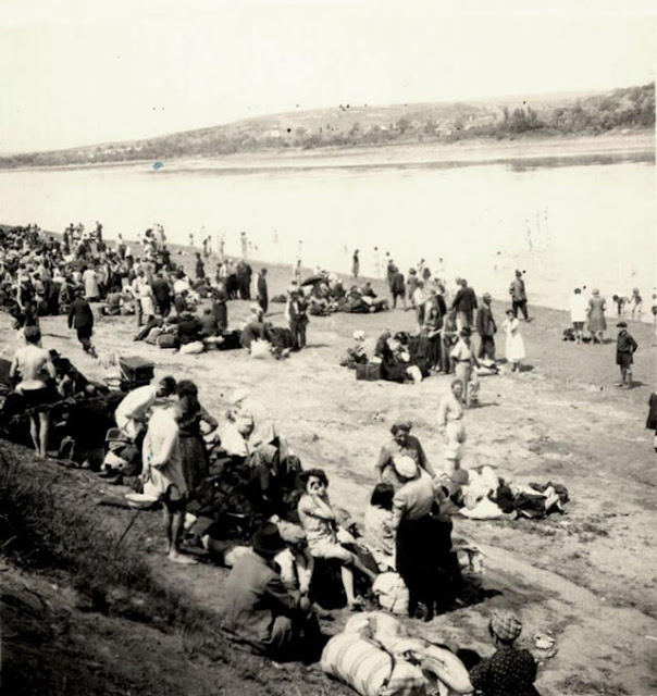 Jewish residents assembling at the Dneipr River for transport to concentration camps, 10 June 1942 worldwartwo.filminspector.com