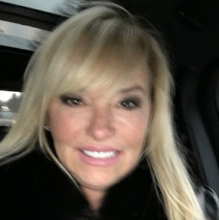 Lori Brice clicking selfie with sitting inside the car
